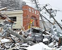 Japan battles to care for 100,000 evacuees after quake
