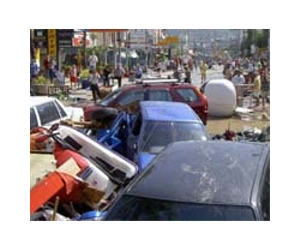 Swiss Re net profits up sharply to $2.6bn despite disasters