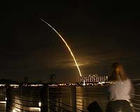 Shuttle Discovery lifts off, enters orbit