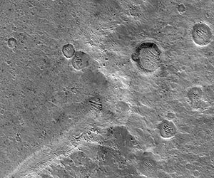 NASA Partners Uncover New Hypothesis On Crater Debris