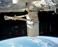 'Dragon captured' as cargo arrives at space station