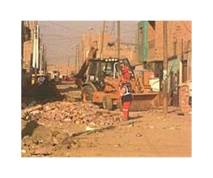 Building codes, quake locations key to Chile-Haiti tolls