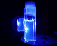 A novel inorganic material emitting laser light in solution is discovered