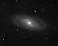 Astronomers Dissect A Supermassive Black Hole With Natural Magnifying Glasses