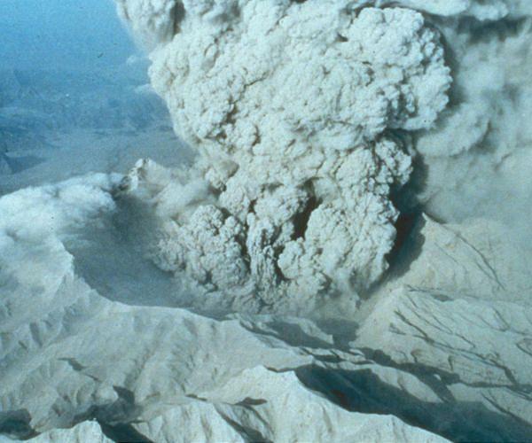 Caldera Collapse Increases the Size and Duration of Volcanic Eruptions