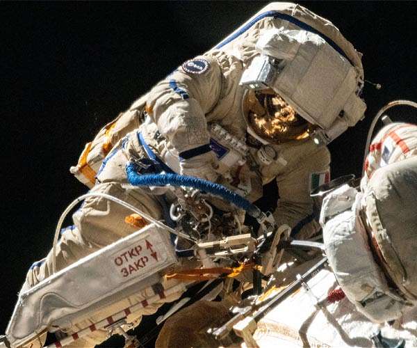 NASA to resume spacewalks after investigation into 'close call'