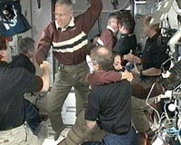 US shuttle Discovery docks with space station