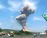 25 hurt as fire, blasts rock Philippine army munitions depot