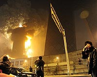 Fire engulfs Beijing hotel near cutting-edge TV tower