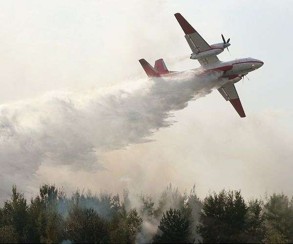 Man killed in Greece wildfires as new blazes rage