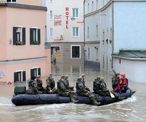 Germany steps up evacuations as floods swamp central Europe