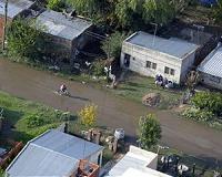 South American floods kill 12, force mass evacuations