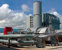 Greening the electric grid with gas turbines