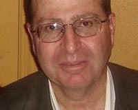 Moshe Yaalon: Israel's hardline defence minister keeps office