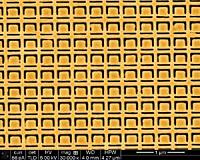 Breaking metamaterial symmetry with reflected light