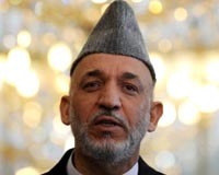 Afghan leader visits village hit by deadly US strike