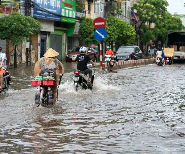 Vietnam evacuates 59,000 as typhoon floods toll climbs to 127