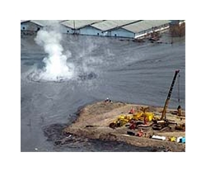 Experts dispute cause of mud volcano