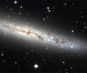 Hubble Eyes Galaxy as Flat as a Pancake