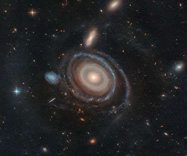 Research reveals tidal forces disrupting nearby dwarf galaxy