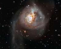 Cosmic collision lights up the darkness