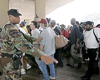 The stubborn hunker down in New Orleans as hordes flee