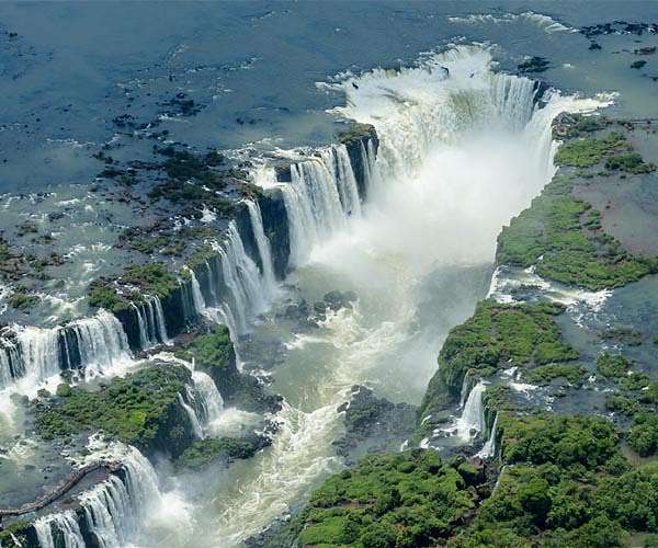 Severe storms swell Iguazu falls to 10 times normal flow