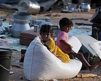 Survivors of deadly India floods return to wrecked homes