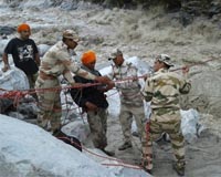 Rescuers battle rain in search for India landslide victims