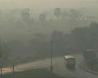 To conserve water, Indian farmers fire up air pollution
