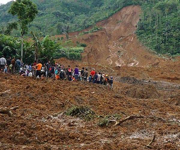 Two dead, 10 missing after Indonesia floods and landslide