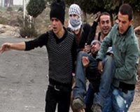 Palestinians bury their dead after Israel kills nine in border clashes