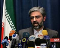 Iran says nuclear cooperation to prevent new sanctions