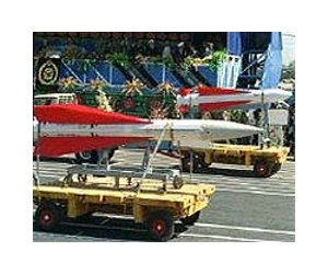 Iran parades military, warns Israel