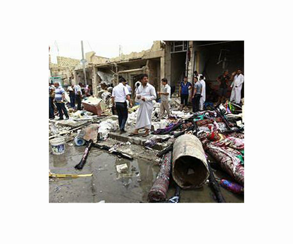 Iraq market suicide bombing claimed by IS kills nearly 30