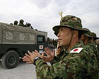 Japan opposition votes to end Iraq mission