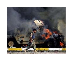 Car bomb and attack on north Iraq police HQ kills 30