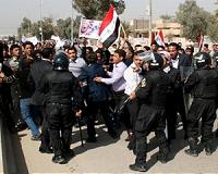 Thousands in bloody protests across Iraq, 30 dead