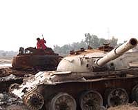 Radioactive wreckage, landmines blight Iraq: minister