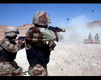 Gates optimistic that Iraq troop cutbacks will continue