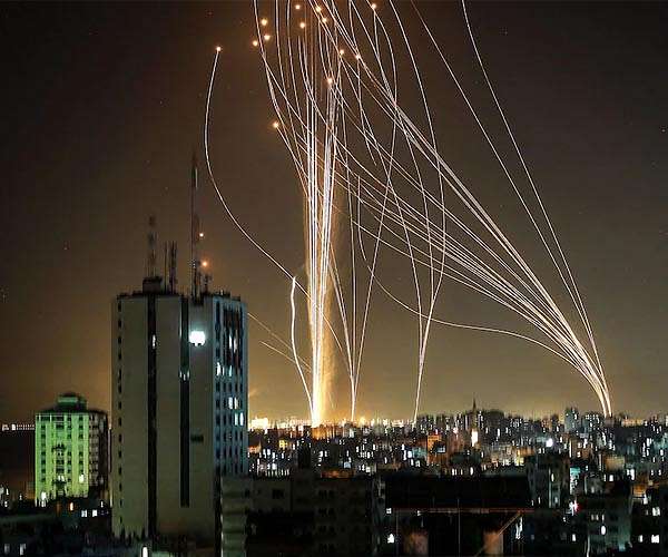 Israel and Hamas trade strikes as Palestinian toll mounts