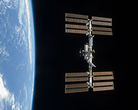 Discovery docks with International Space Station