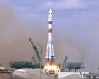 ISS crew blast off against virus-hit build up