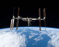 Atlantis astronauts install gadgets on second spacewalk