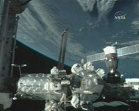 STS-117 Shuttle Crew Conduct Fourth And Final Spacewalk About Space Station