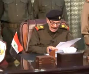 Fugitive Saddam-era VP backs Iraq demos in video