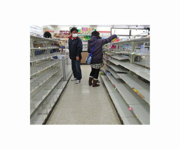 Anxiety and empty shelves as Shanghai Covid-19 cases surge
