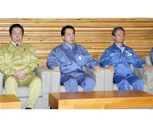 Japan PM vows help in first tour of tsunami zone