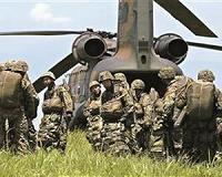 Japan cabinet OKs military expansion rules
