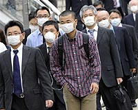 Swine flu hits Tokyo as cases surge past 10,000